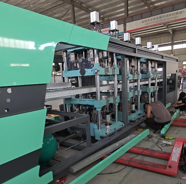 Multi-station plastic thermoforming machine